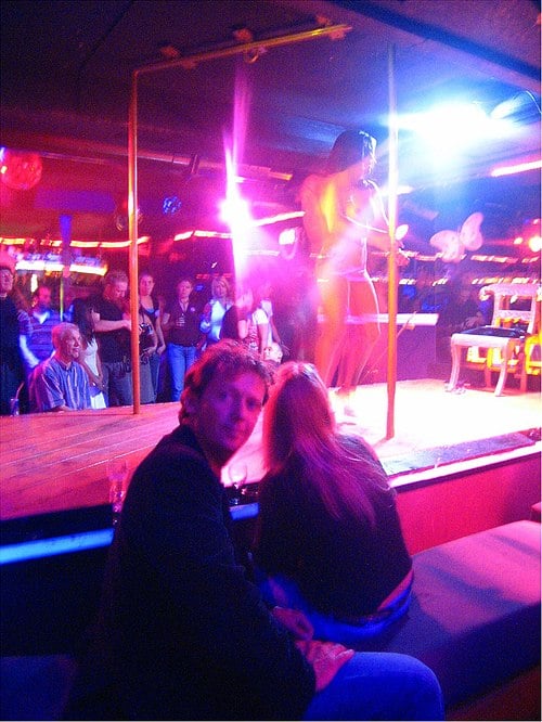 Strip Club Customers Seated at Tip Rail.jpg